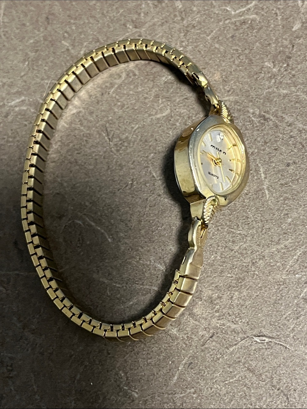 Ladies Milan diamond gold tone  dial watch-Needs Battery